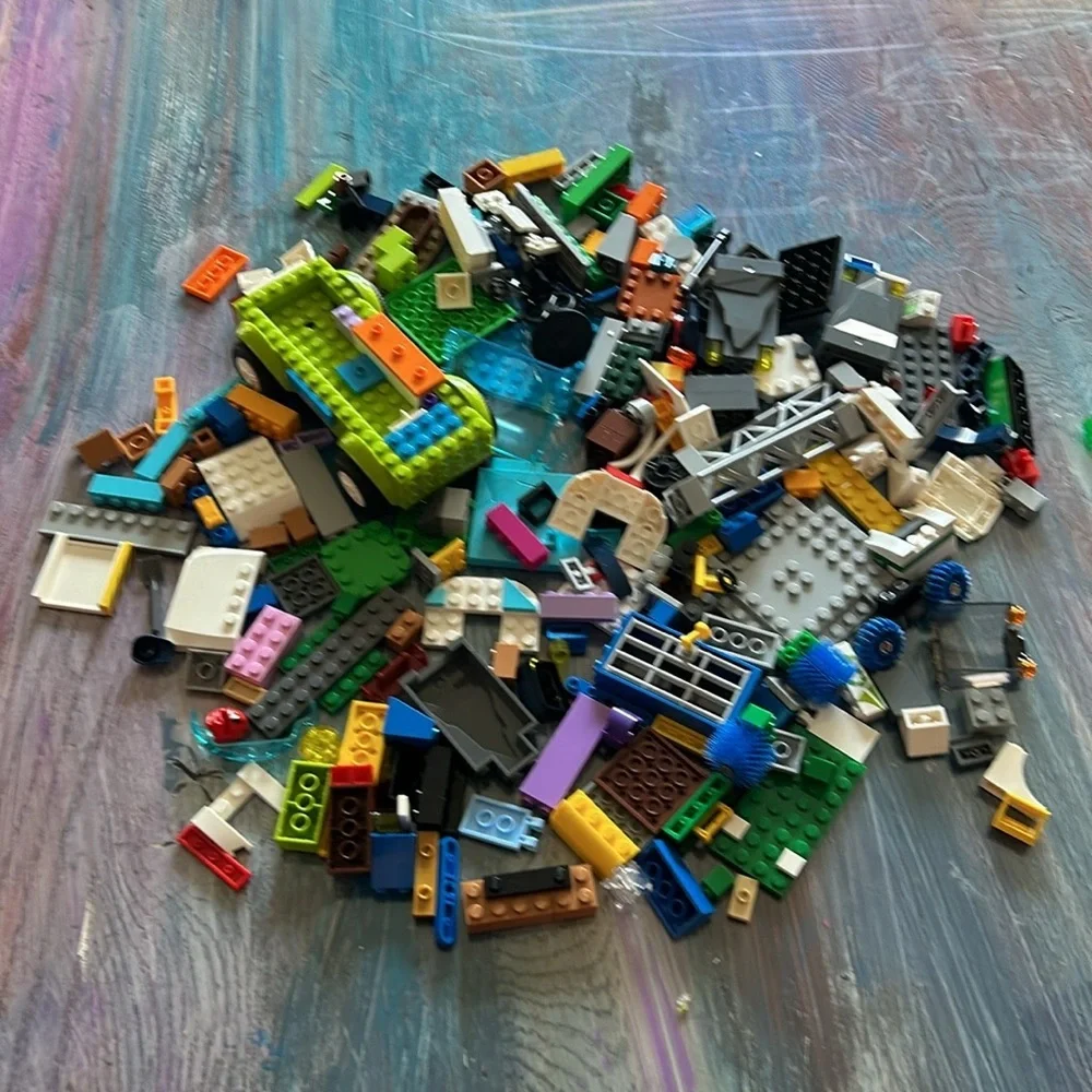 Over 220 Lego pieces from All different boxes